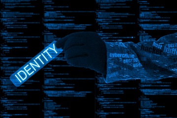 Hand stealing identity computercode cybersecurity concept