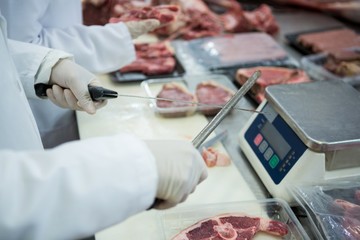 Butcher sharpening his knife