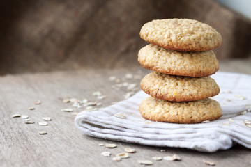 Homemade oatmeal cookies on checkered kitchen towel