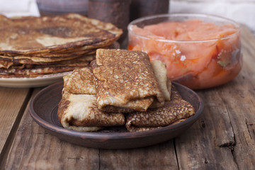  Pancakes of rye flour with salted salmon.