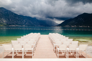 wedding chairs with flowers decoration