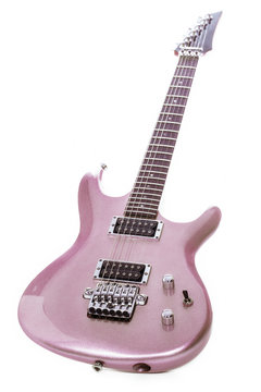 Classic pink electric guitar isolated against white background