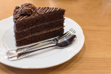 Chocolate cake on wooden table