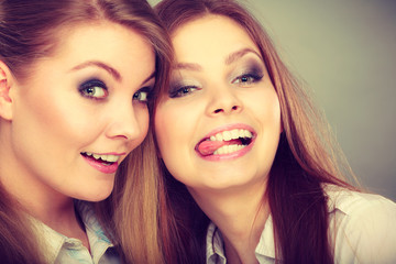 Two beautiful women having fun