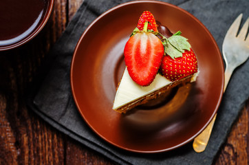 Carrot cake decorated with strawberries