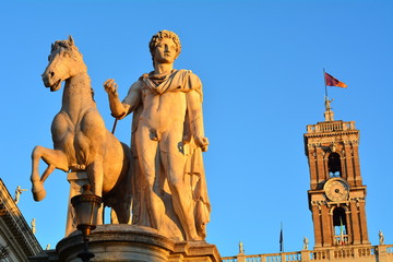Fototapeta premium Renaissance statues of the Capitol Palace in Rome at sunset, Italy.