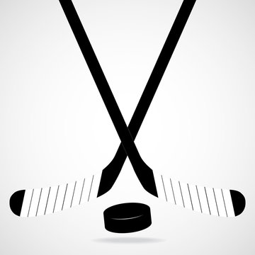 Hockey stick and puck, isolated on a white background