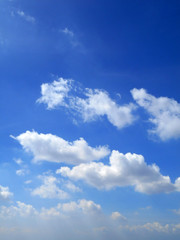 Naklejka na ściany i meble Clouds in the blue sky background