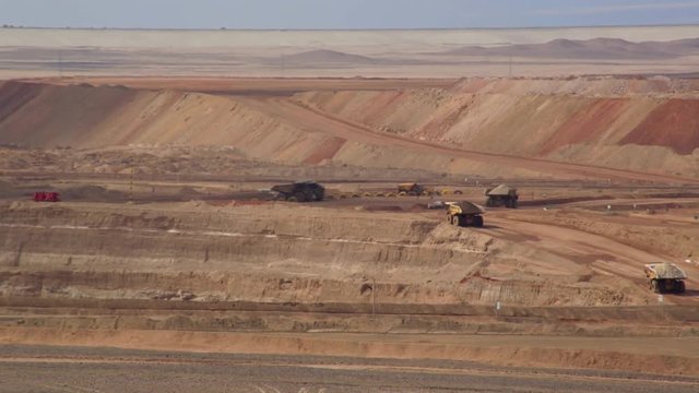 Generic footage of mine. Wide view of the activities of a mine in the middle of the Atacama Desert in Chile.