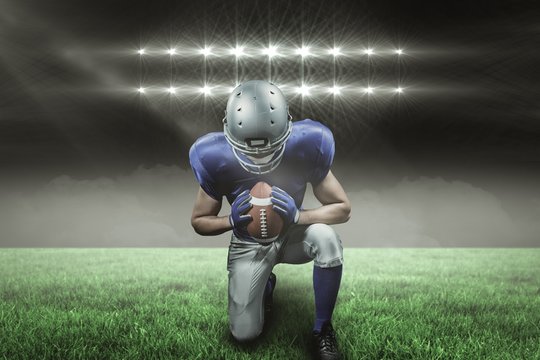 Composite image of american football player kneeling with 3d 