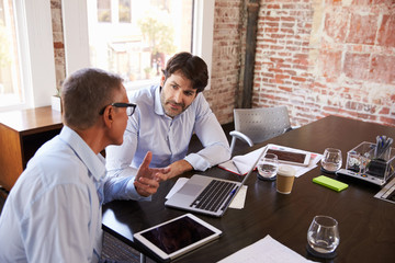 Businessmen Having Creative Brainstorming Meeting In Office