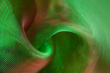 organza textile in green red, close-up of textile structure