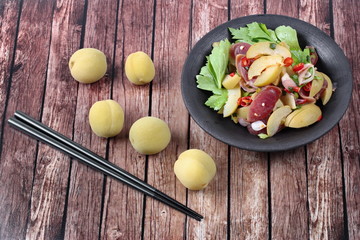 Spicy sour Chinese sausage salad with Peach honey - compote .