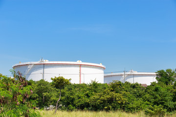 Fototapeta na wymiar large white tank in oil refinery industry