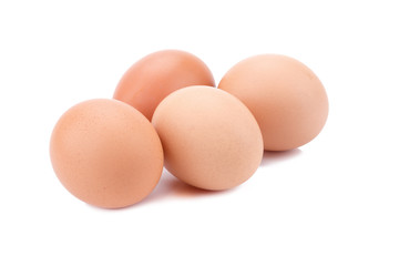 Brown eggs isolated on white background.
