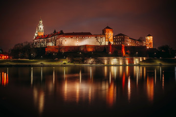Obraz premium Fantastic night Krakow. The Royal Wawel Castle in Poland