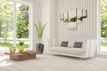 White room with sofa. Scandinavian interior design