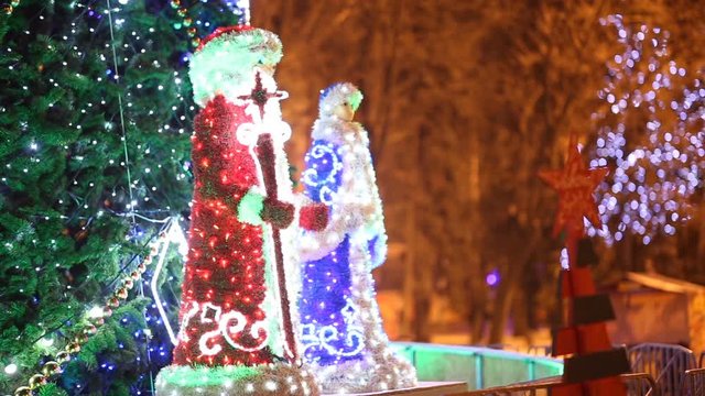 Father Frost and Snow Maiden under the Christmas tree