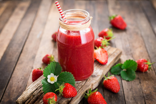 Strawberry smoothie in the glass jar