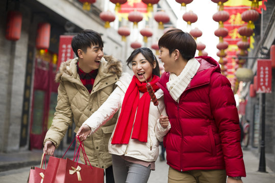 Young friends shopping for Chinese New Year