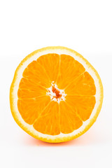 Closeup of inside of an orange cut in half on a white background