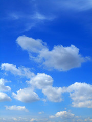 Naklejka na ściany i meble Clouds in the Blue Sky Background