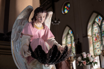 Obraz na płótnie Canvas Statue in church / View of angel statue in the church.