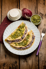 pesto crepes filled with ricotta and chicory