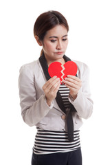 Beautiful young Asian woman with broken heart.