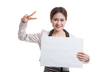 Fototapeta premium Young Asian business woman show victory sign with blank sign.