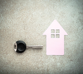 Fototapeta na wymiar Key and house symbol. Concept of a new home or real estate business.