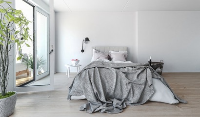 Modern bedroom interior with rumpled bedclothes