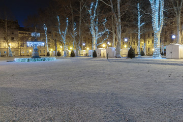 Zrinjevac park Fountain decorated by Christmas lights as part of Advent in Zagreb. Fountain is known as The Mushroom. Copy space