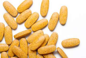 dietary supplement. multivitamin tablets on white background
