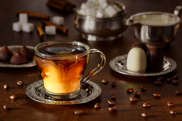 Still life with coffee, cream and coffee beans
