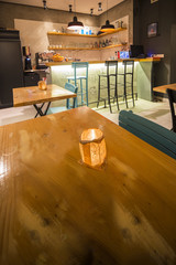 candle in modern colorful cafe interior.selective focus