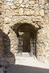 Obraz premium Iron door, Town of Consuegra in the province of Toledo, Spain