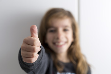 Girl with thumb up