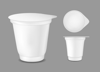 White empty plastic container for yogurt. Packaging for sour cream