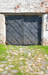 Old metal medieval gate.