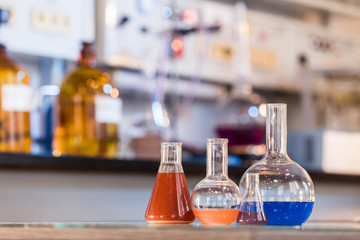 Beaker with colorful liquid in the laboratory