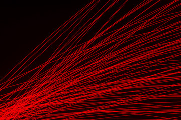 background abstract light with glowing red rays on black