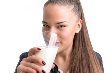 Young woman drink milk. isolated white.