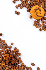 Cup of coffee and beans with delicious macaroon on a white backg