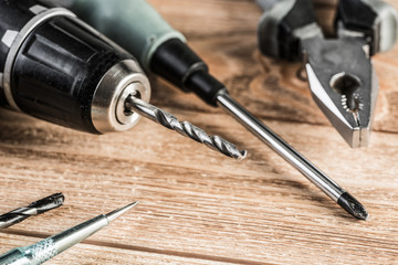 Carpentry tools on wooden surface
