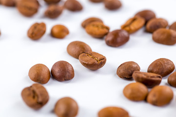 Coffee cup and beans on a white background.