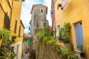Fototapeta premium Old narrow street in Menton, France