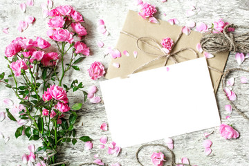 blank white greeting card with pink rose flowers bouquet