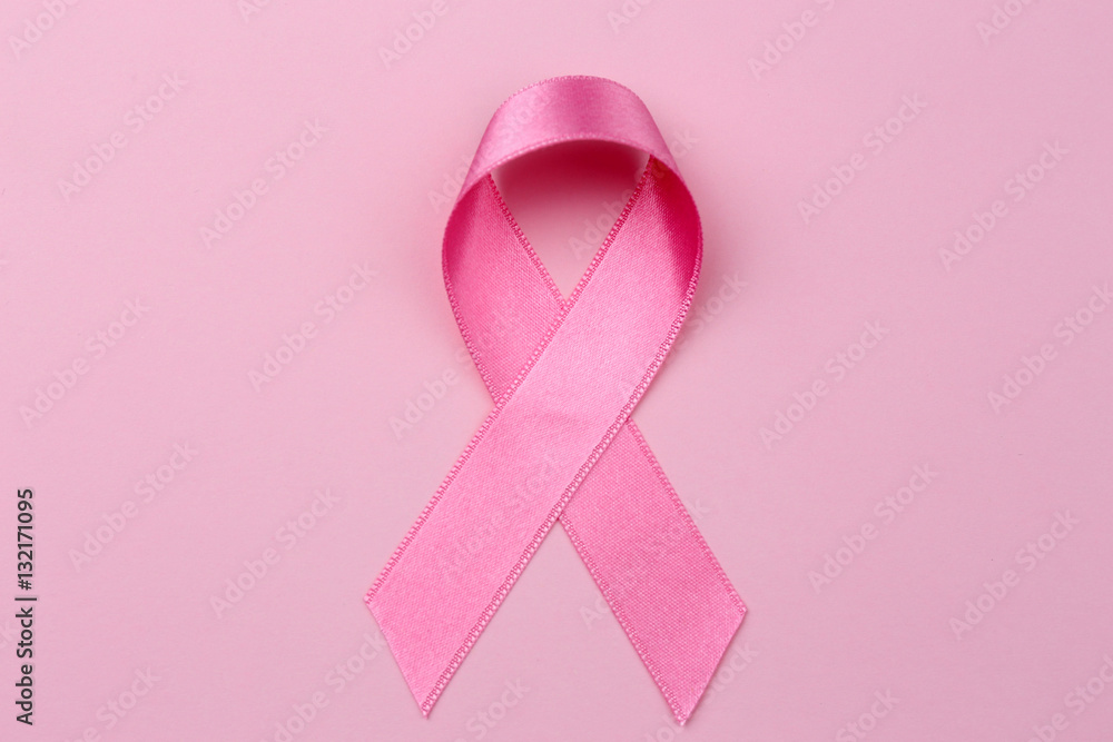 Sticker Pink ribbon on color background. Breast cancer concept