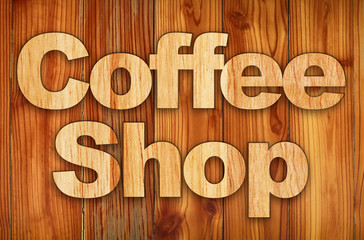 Beautiful wood background. Wooden words around about coffee shop or business. Coffee shop tags and banner equipments. A label for commercial use.
